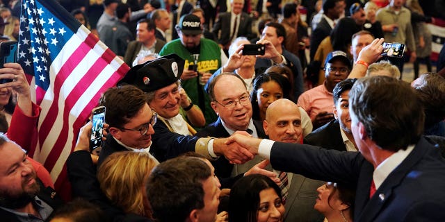 Virginia Republican gubernatorial nominee Glenn Youngkin greets supporters in the crowd after speaking during his election night party at a hotel in Chantilly, Virginia, U.S., November 3, 2021.