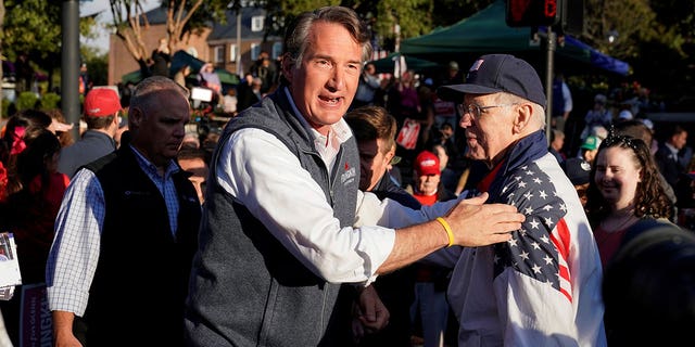 Virginia Republican Gov. nominee Glenn Youngkin speaks at a campaign event at Old Town Alexandria's Farmers Market in Alexandria, Virginia, USA, on October 30, 2021.