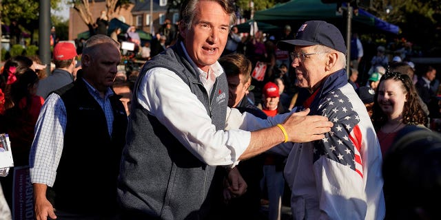 Virginia Republican gubernatorial nominee Glenn Youngkin speaks during a campaign event in Old Town Alexandria’s Farmers Market in Alexandria, Virginia, U.S., October 30, 2021.