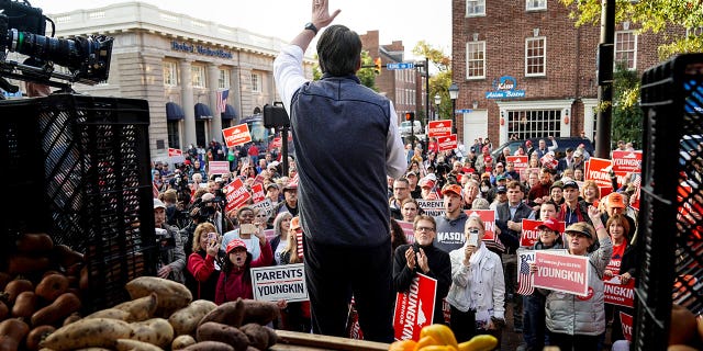 Virginia Republican gubernatorial nominee Glenn Youngkin speaks during a campaign event in Old Town Alexandria’s Farmers Market in Alexandria, Virginia, October 30, 2021. REUTERS/Joshua Roberts