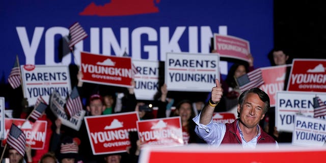 Virginia Republican gubernatorial nominee Glenn Youngkin gestures during a [Loudoun Parents Matter Rally] campaign event in Leesburg, Virginia, on Nov. 1, 2021.