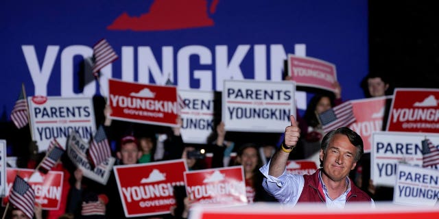 Virginia Republican gubernatorial nominee Glenn Youngkin gestures during a [Loudoun Parents Matter Rally] campaign event in Leesburg, Virginia, on Nov. 1, 2021.