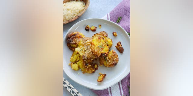 Chelsea Plummer recommends cooking garlic smashed air fryer potatoes for three to five minutes at 375 degrees Fahrenheit.