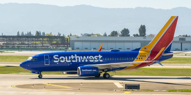 Southwest Airlines Boeing 737-700 aircraft seen at Norman Y. Mineta San Jose International Airport on Feb. 25, 2020. (Photo by Alex Tai/SOPA Images/LightRocket via Getty Images)