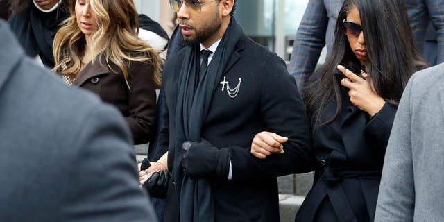 Flanked by attorneys and supporters, actor Jussie Smollett walks out of the Leighton Criminal Courthouse today after pleading not guilty to a new indictment on Feb. 24, 2020 in Chicago, Illinois. (Photo by Nuccio DiNuzzo/Getty Images)