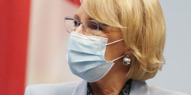 U.S. Secretary of Education Betsy DeVos listens during a visit to Florida Virtual School in Orlando on Monday, Oct. 26, 2020. (Stephen M. Dowell/Orlando Sentinel/Tribune News Service via Getty Images)