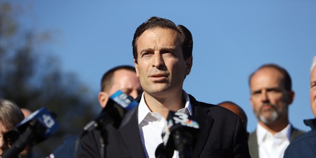 Nevada Attorney General Adam Laxalt, center, speaks during a Trump campaign press conference outside the Clark County Elections Department in Las Vegas, Nevada, U.S., Thursday, Nov. 5, 2020. Photographer: Joe Buglewicz/Bloomberg via Getty Images