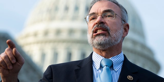 UNITED STATES - DECEMBER 3: Rep. Andy Harris, R-Md., and members of the House Freedom Caucus conduct a news conference to call on Attorney General William Barr to release findings of an investigation into allegations of 2020 election fraud, outside the Capitol on Thursday, December 3, 2020. (Photo By Tom Williams/CQ-Roll Call, Inc via Getty Images)