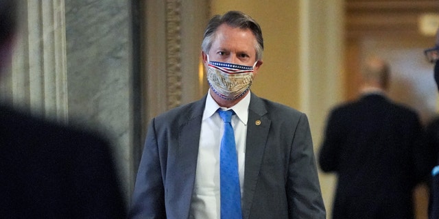 Sen. Roger Marshall, R-Kan., arrives at the Senate chamber before the fifth day of the Senate impeachment trial for former President Trump on Capitol Hill Feb. 13, 2021, in Washington, D.C.