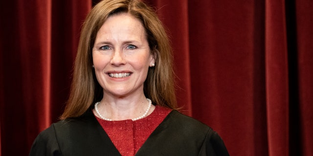 Associate Justice Amy Coney Barrett stands during a group photo of the Justices at the Supreme Court in Washington, D.C., on April 23, 2021. (Photo by Erin Schaff-Pool/Getty Images)