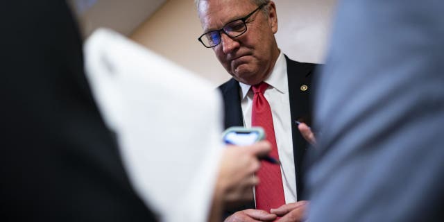 Sen. Kevin Cramer, a Republican from North Dakota, speaks with members of the media while arriving for a vote at the U.S. Capitol in Washington, D.C., on Tuesday, July 27, 2021.