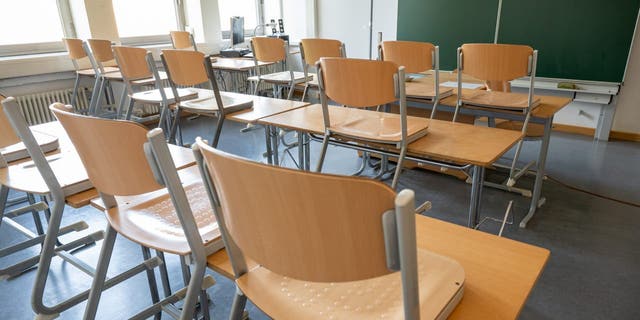An empty classroom with the chairs up in Bavaria, Munich. (Peter Kneffel/picture alliance via Getty Images)
