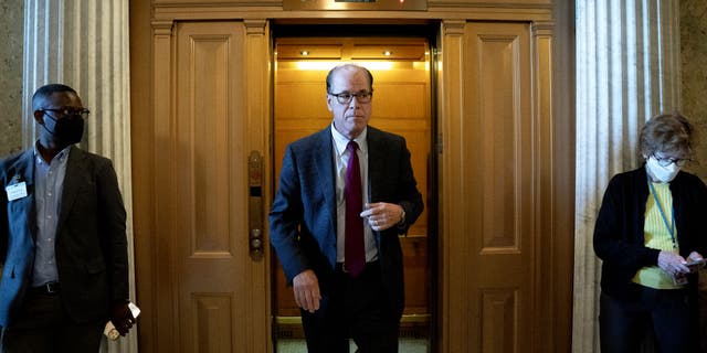 Senator Mike Braun, a Republican from Indiana, center, walks to Senate Republican policy luncheons at the U.S. Capitol in Washington, D.C., Thursday, Oct. 7, 2021.