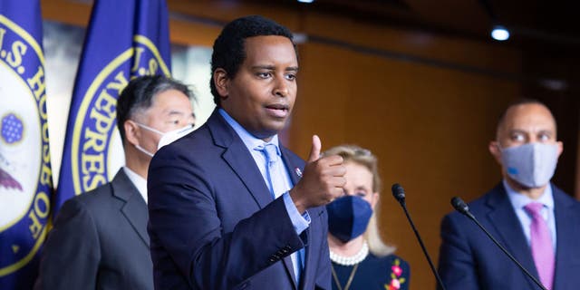 House Rep. Joe Neguse, D.-Colo., speaks during a press conference after a House Democratic Caucus meeting at the U.S. Capitol on Nov. 2, 2021, in Washington, D.C. Left to right, Ted Lieu, D.-Calif., Debbie Dingell, D-Mich., and Chairman Hakeem Jeffries, D.-N.Y. (Photo by Allison Shelley/Getty Images)