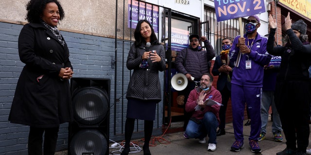 Michelle Wu thanks Acting Mayor Kim Janey for her efforts at a Get Out The Vote Canvass Kickoff in Boston on Election Day, Nov. 2, 2021. 