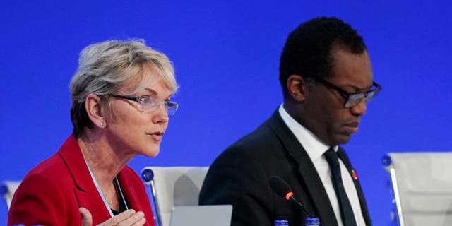 GLASGOW, SCOTLAND - NOVEMBER 04: U.S. Secretary of Energy Jennifer Granholm (L) and British Secretary of State for Business, Energy and Industrial Strategy Kwasi Kwarteng speak to delegates during day five of COP26 at SECC on November 3, 2021 in Glasgow, Scotland. Today COP26 will focus on accelerating the global transition to clean energy. The 2021 climate summit in Glasgow is the 26th "Conference of the Parties" and represents a gathering of all the countries signed on to the U.N. Framework Convention on Climate Change and the Paris Climate Agreement. The aim of this year's conference is to commit countries to net zero carbon emissions by 2050. (Photo by Ian Forsyth/Getty Images)