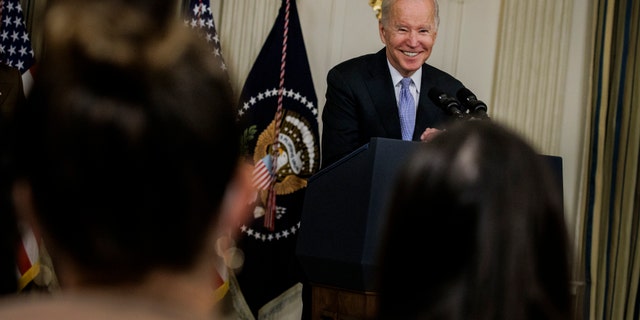President Biden speaks to reporters in the State Dinning Room at the White House on Nov. 6, 2021, in Washington.