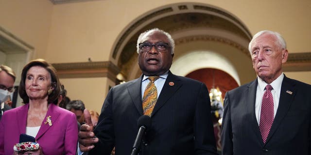 House Majority Whip Jim Clyburn, D-S.C., Speaker of the House Nancy Pelosi, D-Calif., and House Majority Leader Steny Hoyer, D-Md., conduct a news conference on plans to move forward with the Build Back Better Act and the infrastructure bill in the U.S. Capitol on Friday, Nov. 5, 2021. (Photo By Tom Williams/CQ-Roll Call, Inc via Getty Images)