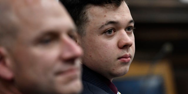 KENOSHA, WISCONSIN - NOVEMBER 11: Kyle Rittenhouse, right, and his attorney Corey Chirafisi listen during the trial at the Kenosha County Courthouse on November 11, 2021 in Kenosha, Wisconsin. Rittenhouse is accused of shooting three demonstrators, killing two of them, during a night of unrest that erupted in Kenosha after a police officer shot Jacob Blake seven times in the back while being arrested in August 2020. Rittenhouse, from Antioch, Illinois, was 17 at the time of the shooting and armed with an assault rifle. He faces counts of felony homicide and felony attempted homicide. (Photo by Sean Krajacic-Pool/Getty Images)