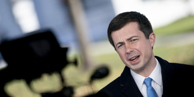 Transportation Secretary Pete Buttigieg during a TV interview outside the White House in Washington, D.C., on Monday, Nov. 15, 2021. (Stefani Reynolds/Bloomberg via Getty Images)