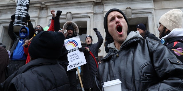 BLM protesters and Kyle Rittenhouse supporters continue to demonstrate outside of the Kenosha County Courthouse on the third day in the trial of Kyle Rittenhouse on November 18, 2021 in Kenosha, Wisconsin, United States. (Photo by Tayfun Coskun/Anadolu Agency via Getty Images)