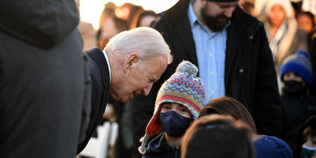 US President Joe Biden greets attendees during the White House Thanksgiving turkey pardon in the Rose Garden of the White House in Washington, DC on November 19, 2021. (Photo by OLIVIER DOULIERY/AFP via Getty Images)
