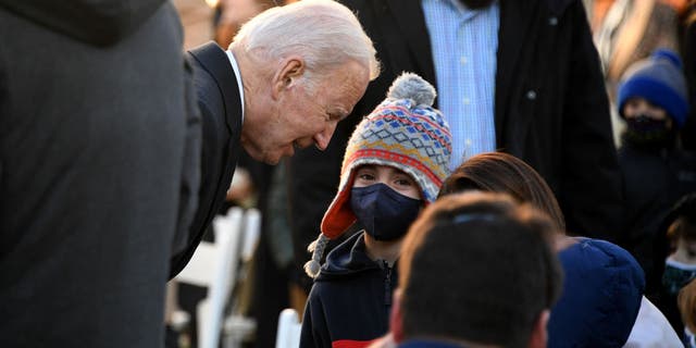 US President Joe Biden greets attendees during the White House Thanksgiving turkey pardon in the Rose Garden of the White House in Washington, DC on November 19, 2021. (Photo by OLIVIER DOULIERY/AFP via Getty Images)