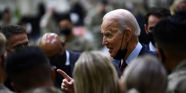 US President Joe Biden greets soldiers at Fort Bragg to mark the upcoming Thanksgiving holiday on November 22, 2021.