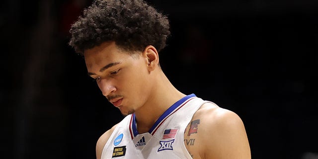 INDIANAPOLIS, INDIANA - MARCH 22: Jalen Wilson #10 of the Kansas Jayhawks walks off the court after being defeated 85-51 by the USC Trojans in their second round game of the 2021 NCAA Men's Basketball Tournament at Hinkle Fieldhouse on March 22, 2021 in Indianapolis, Indiana. (Photo by Gregory Shamus/Getty Images)