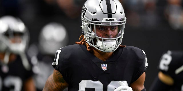 Cornerback Damon Arnette #20 of the Las Vegas Raiders warms up before a preseason game against the Seattle Seahawks at Allegiant Stadium on Aug. 14, 2021 in Las Vegas, Nevada. The Raiders defeated the Seahawks 20-7.