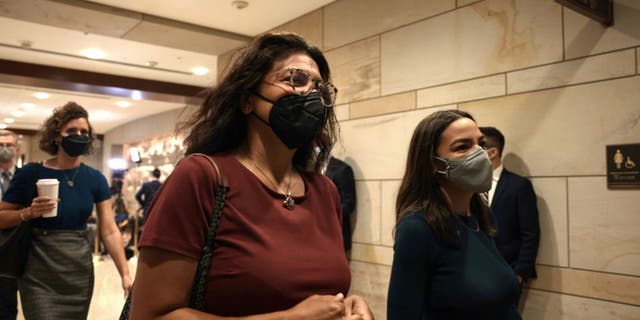 Reps. Rashida Tlaib (left) and Alexandria Ocasio-Cortez arrive for a briefing on Afghanistan at the Capitol on Aug. 24, 2021. (Anna Moneymaker/Getty Images)