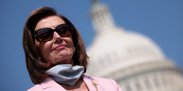 WASHINGTON, DC - AUGUST 25:  U.S. Speaker of the House Nancy Pelosi (D-CA) waits to speak during a press conference with members of the Poor People’s Campaign outside the U.S. Capitol August 25, 2021 in Washington, DC.  (Photo by Win McNamee/Getty Images)