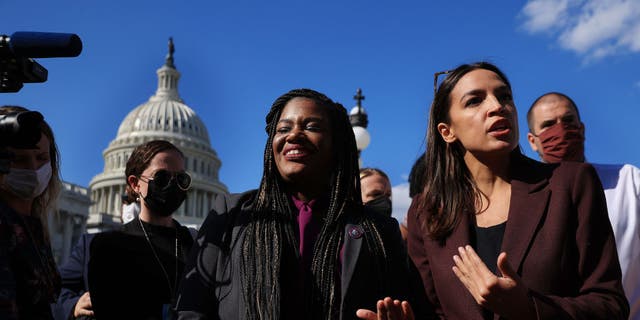 Congressional Progressive Caucus members Rep. Cori Bush, D-Ga., and Rep. Alexandria Ocasio-Cortez, D-N.Y., talk to reporters before a vote to keep the federal government open until early December outside the U.S. Capitol on Sept. 30, 2021 in Washington, D.C.  (Photo by Chip Somodevilla/Getty Images)