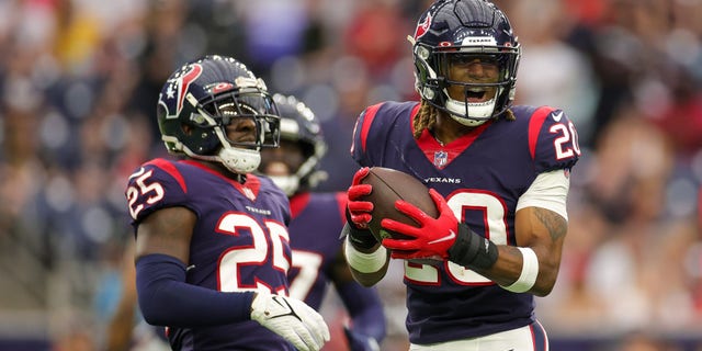 Justin Reid (20) of the Houston Texans reacts after missing an interception during the first half against the New England Patriots at NRG Stadium Oct. 10, 2021, in Houston.