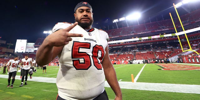 Vita Vea of the Tampa Bay Buccaneers celebrates after beating the Chicago Bears 38-3 at Raymond James Stadium Oct. 24, 2021 in Tampa, Fla.