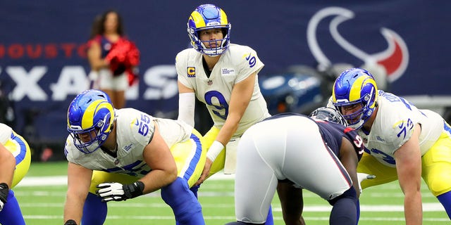 HOUSTON, TEXAS - OCTOBER 31: Matthew Stafford #9 of the Los Angeles Rams under center during the first half against the Houston Texans at NRG Stadium on October 31, 2021 in Houston, Texas. (Photo by Bob Levey/Getty Images)
