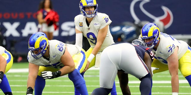Matthew Stafford (9) of the Los Angeles Rams under center during the first half against the Houston Texans at NRG Stadium on Oct. 31, 2021, in Houston, Texas.
