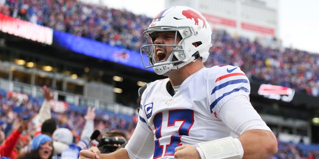 Josh Allen #17 of the Buffalo Bills celebrates after a touchdown run during the fourth quarter against the Miami Dolphins at Highmark Stadium on October 31, 2021 in Orchard Park, New York.