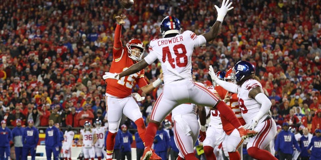 KANSAS CITY, MISSOURI - NOVEMBER 01: Patrick Mahomes #15 of the Kansas City Chiefs throws an interception in the end zone for a touchback during the first half against the New York Giants at Arrowhead Stadium on November 01, 2021 in Kansas City, Missouri. (Photo by Jamie Squire/Getty Images)
