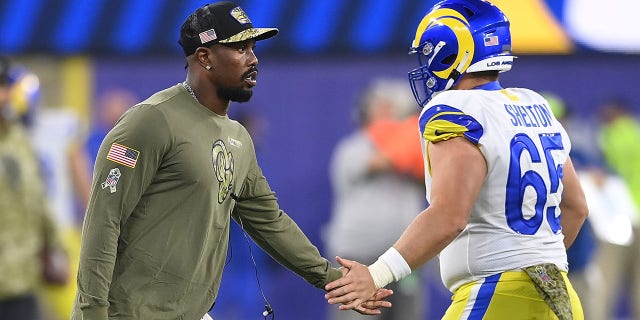 INGLEWOOD, CALIFORNIA - NOVEMBER 07: Von Miller #40 of the Los Angeles Rams reacts with Coleman Shelton #65 against the Tennessee Titans during the first quarter at SoFi Stadium on November 07, 2021 in Inglewood, California.