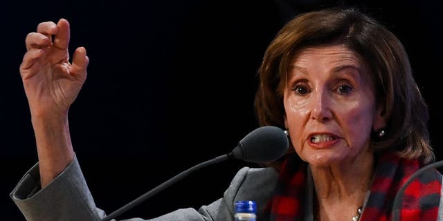 Speaker of the House Nancy Pelosi attends a press conference during COP26 on Nov. 10, 2021 in Glasgow, Scotland. (Photo by Jeff J Mitchell/Getty Images)