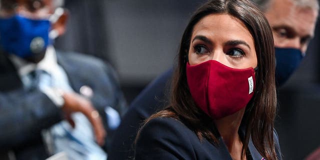 Rep. Alexandria Ocasio-Cortez attends a press conference during the U.N. climate conference in Glasgow, Scotland, on Nov. 10, 2021. (Jeff J. Mitchell/Getty Images)