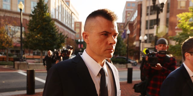 ALEXANDRIA, VA - NOVEMBER 10: Russian analyst Igor Danchenko arrives at the Albert V. Bryan U.S. Courthouse before being arraigned on November 10, 2021 in Alexandria, Virginia. (Photo by Chip Somodevilla/Getty Images)
