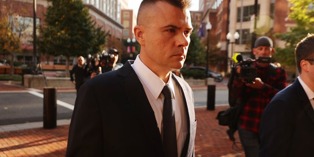 ALEXANDRIA, VA - NOVEMBER 10: Russian analyst Igor Danchenko arrives at the Albert V. Bryan U.S. Courthouse before being arraigned on November 10, 2021 in Alexandria, Virginia. (Photo by Chip Somodevilla/Getty Images)