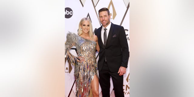 Carrie Underwood and Mike Fisher made the 2021 CMA Awards a date night.