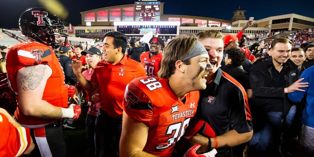 Defensive back Jett Whitfield (38) of the Texas Tech Red Raiders celebrates after a game against the Iowa State Cyclones Nov. 13, 2021 in Lubbock, Texas.