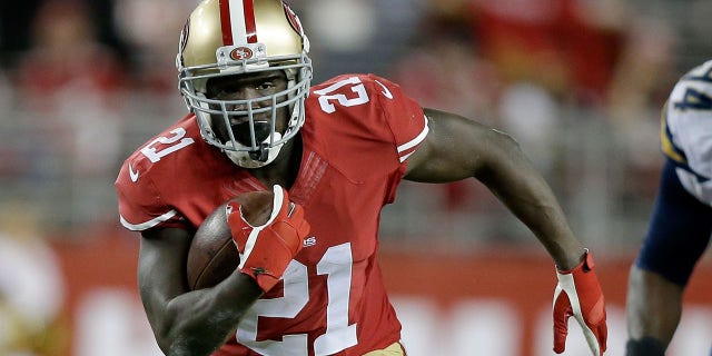 Running back Frank Gore of the San Francisco 49ers runs the ball in the first half against the San Diego Chargers at Levi's Stadium Dec. 20, 2014. in Santa Clara, Calif.