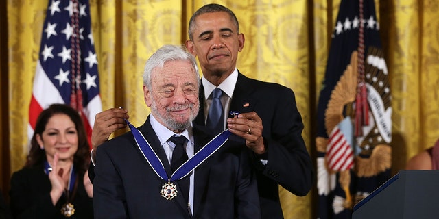 U.S. President Barack Obama presents the Presidential Medal of Freedom to theater composer and lyricist Stephen Sondheim during an East Room ceremony November 24, 2015 at the White House in Washington, DC.