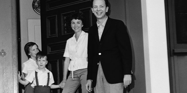 American television actor Don Knotts (right) stands his family on the porch of their home, March 2, 1961. From left, daughter Karen, son Tom, Knotts, and wife Kay.