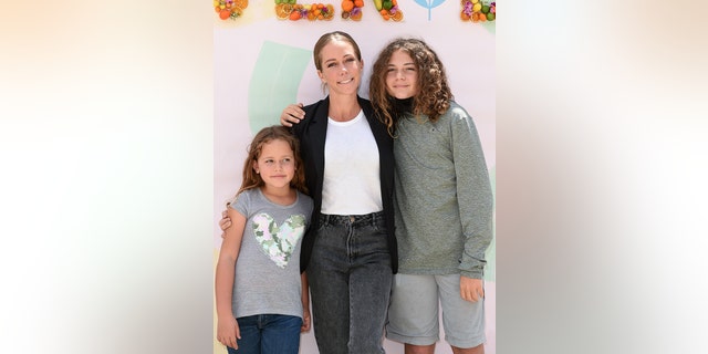 (LR) Kendra Wilkinson is the mother of Alijah Mary Baskett and Hank Baskett IV.